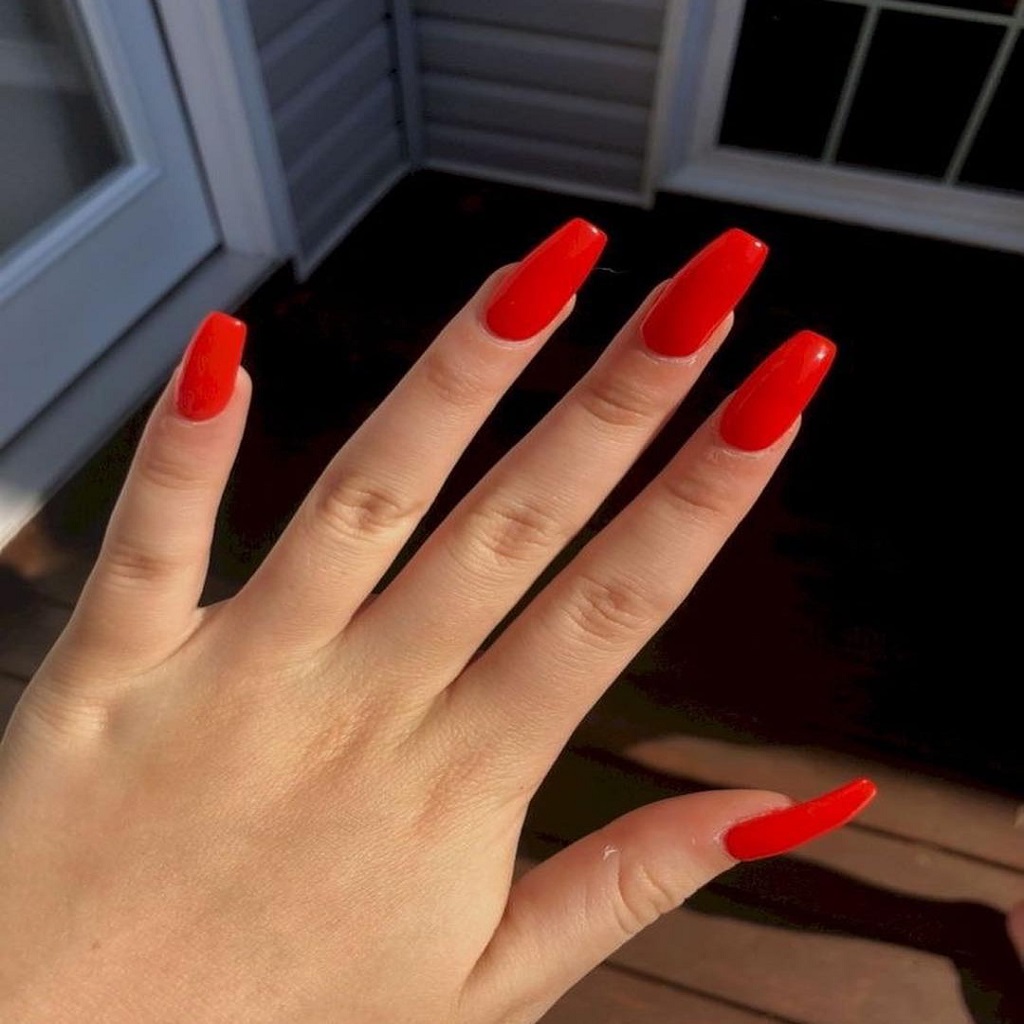 Brilliant orange-red nail design
